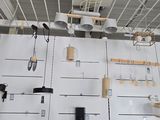 a wall with a bunch of tools hanging on it