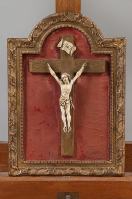 a wooden cross with a crucifix on it