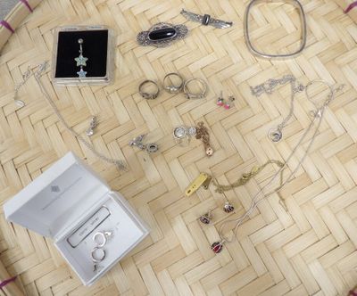 a lot of jewelry sitting on the floor next to each other