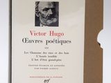the book cover of victor hugo curres in potiques, with a picture of a man in