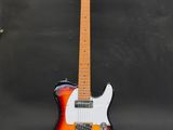 an electric guitar sitting on top of a metal stand