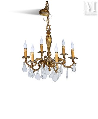 an image of a chandelier with five lights hanging from the ceiling