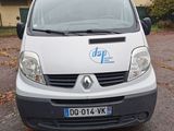 a white van that is parked in a parking lot