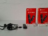 deux boîtes de télécommandes Wii posées sur une table