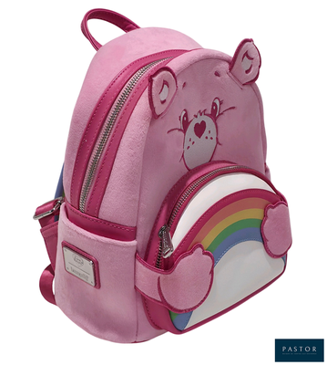 un sac à dos rose avec un ours sur le devant et un arc-en-ciel dans le dos