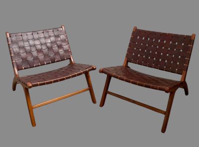 two chairs that are sitting next to each other