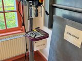 a machine that is sitting in front of a window