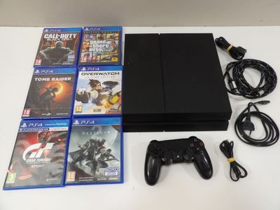 Console Sony PlayStation 4 Slim 1 To noire avec jeux et accessoires
