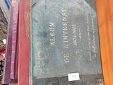 several books are stacked on top of each other on a table