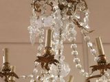 a chandelier hanging from the ceiling in a room