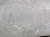 a picture of a mattress that has been wrapped in plastic