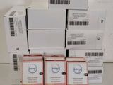 several boxes of skin care products stacked on top of each other