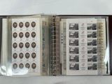 an open book with stamps on it sitting on a table