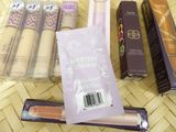a lot of makeup products that are on the table