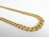 a gold chain on a white background