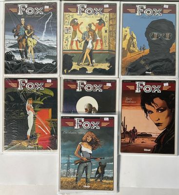a lot of comic books on display on the wall