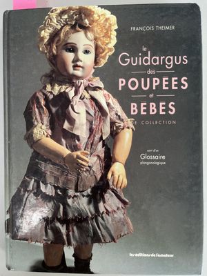 an image of a book with a picture of a doll on it
