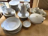 a table with a lot of plates and cups on it