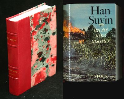 two books that are sitting side by side on a table