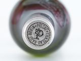 a close up of a wine bottle with a label on it