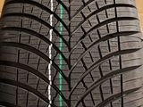 a close up of a tire on a wooden surface