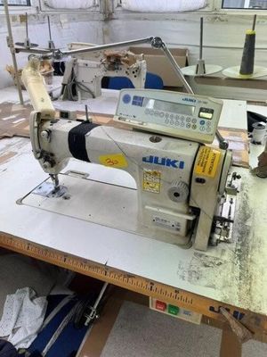 a sewing machine that is sitting on a table