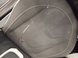 a picture of a car seat with a broken arm rest