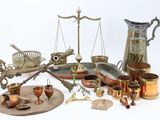 a lot of antique items that are on the table