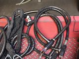 a lot of hoses that are laying on the floor