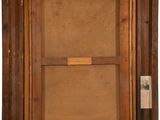 an old picture of a wooden frame with a label on it