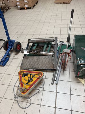 a lot of tools that are sitting on the floor