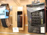 two tires on display in a store for sale