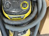 an image of a yellow and black vacuum cleaner