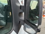 a white truck with a mirror on the side of it