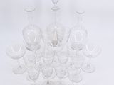a lot of empty wine glasses sitting on a table