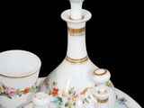 a picture of a set of porcelain objects on a plate