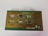 a close up of a box of nintendo wii games on a white surface