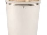 a silver plated cup with a handle on a white background
