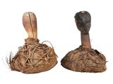 two pieces of wood that have been dug into the ground