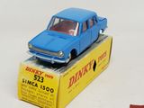 a blue toy car sitting on top of a box