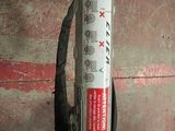 a fire extinguisor attached to a wall in a garage