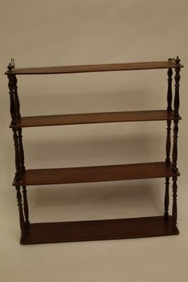 an image of a wooden shelf with three shelves on each side