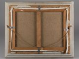 an old picture frame with a picture of two people in it