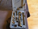 a case that has a bunch of musical instruments in it