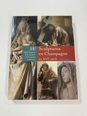 an image of a book with a picture of a woman holding a cross