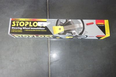 une photo d'une boîte de lubrifiant pour volant Stoploo