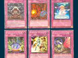 four cards of different types of cards are shown on a blue background