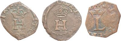 three ancient coins, one of which is a woman and one of which is a man