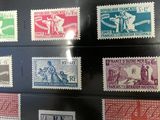 several different types of stamps are on display in a display case