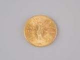 an image of a gold coin on a white surface